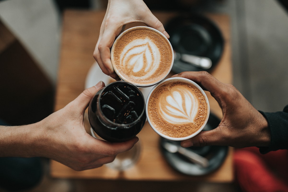 A cup of coffee on a table - understanding caffeine timing for better sleep